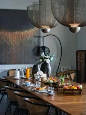 a wooden table with food on top of it at \u9759\u6e7e\u4e4b\u8679VILLA SHOOWA Cape Yamu\u5962\u534e\u6d77\u666f\u522b\u5885 in Ban Bang La