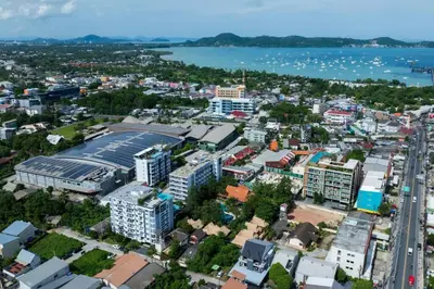 an aerial view of a city with a body of water at Modern & Cozy Apartment 1BR - NV-413 in Chalong