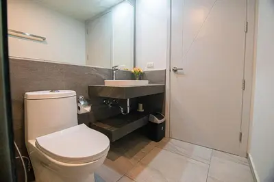 a bathroom with a toilet and a sink at 1BR Apartment near Villa Market - NV-423 in Phuket Town