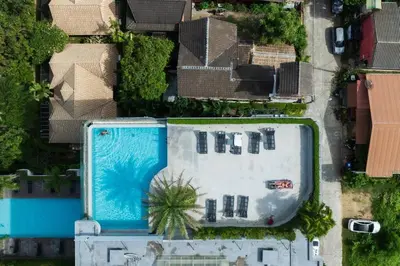 an overhead view of a swimming pool in a house at Well located Apt 1BR - T2-421 in Chalong