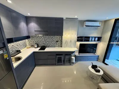a kitchen with a sink and a counter top at 1BDR Roof pool 500m to beach Great gym Parking in Kamala Beach
