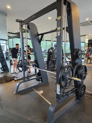 a gym with people working out in the gym at 1BDR Roof pool 500m to beach Great gym Parking in Kamala Beach
