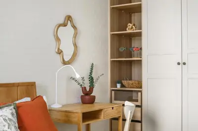 a room with a table with a plant on it at Title Halo Nature Touch 40m2 King Bed Naiyang in Nai Yang Beach