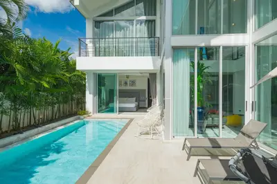an image of a house with a swimming pool at Spacious 4BR Pool Villa at Grand View in Bangtao in Bang Tao Beach