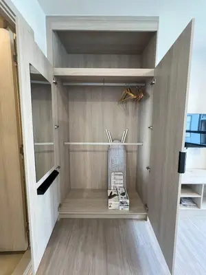 a walk in closet with a book in it at Dcondo Reef Modern Condos 1&2 Bedrooms in Kathu