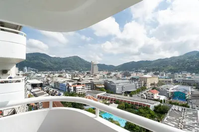 a view of the city from the balcony of a cruise ship at Patong Tower Brand 1-Bedroom apartment mountain view , Near Beach in Patong Beach