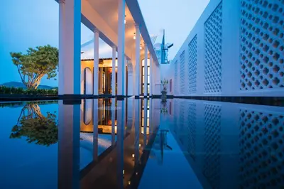 a view of a building and a swimming pool at Little Nyonya Hotel in Phuket Town