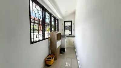 a hallway with two windows in a house at Bayok 10 - 2 Bedroom Villa Near Kathu Waterfall in Ban Huai Luk (1)