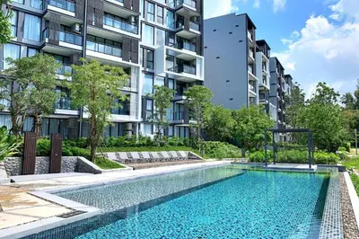 an image of a swimming pool in front of a building at Cassia Phuket laguna 1 BDR in Laguna Phuket
