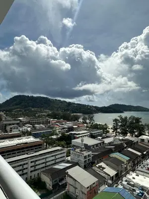 a view of a city with a body of water at Patong Tower sea view 2B in Patong Beach
