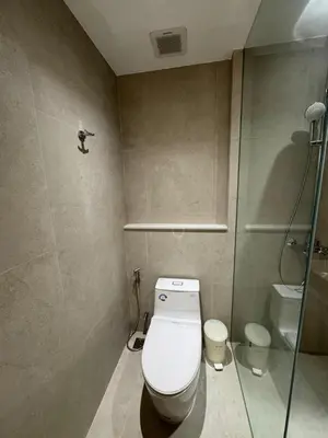 a bathroom with a toilet and a shower at Sea View 3BR Duplex in The Sapphire Bay 88 Residence near Patong and Paradise Beach in Patong Beach