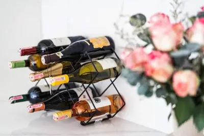 a bunch of wine bottles on a wine rack at Great sea View Roof Top V163 in Kamala Beach