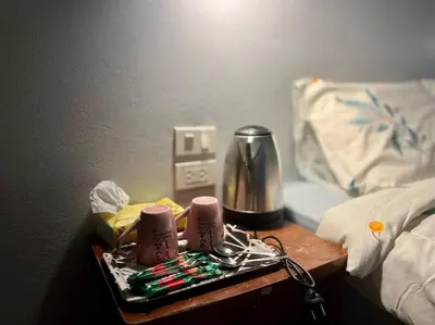 a nightstand with a tray with aperature at \u30a2\u30de\u30c6\u30e9\u30b9\u30d1\u30c8\u30f37 in Patong Beach