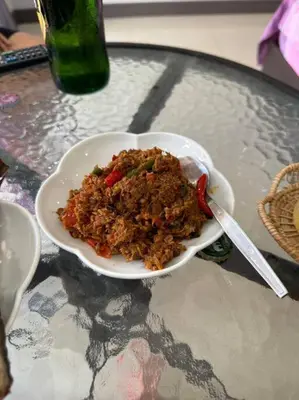 a bowl of food on top of a table at \u30d1\u30c8\u30f3\u30eb\u30fc\u30e07 in Patong Beach