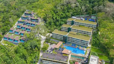 an aerial view of a hotel with a swimming pool at Villa Noon in Patong Beach