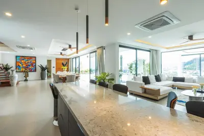 a large living room with a large island in the middle at 