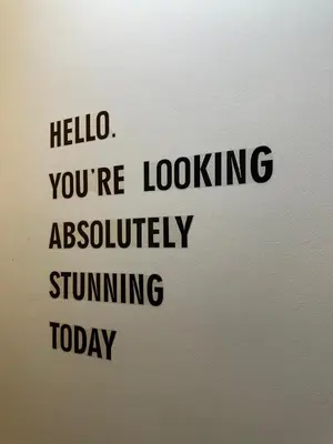 a sign with the words hello youre looking absolutely standing today at Chill-long inn in Ban Klang