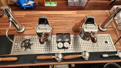 a kitchen counter with two espresso machines on it at IHOC - Phuket OldTown in Ban Lo Long