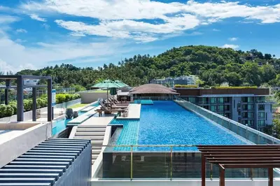 a swimming pool on the roof of a building at Aristo Resort M08 Surin Beach in Surin Beach