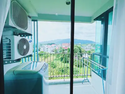 a balcony with a view of a city at 02Nice room phuket town near Shopping Malls and Naka night market in Phuket Town