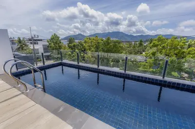 a swimming pool on top of a building at Laguna Parkside by Triple8 Asia in Laguna Phuket