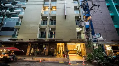 a building in the middle of a city at Hemingway's Hotel in Patong Beach