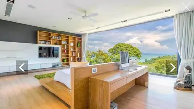 a room with a large window and a desk with a computer at Ocean Heart 5BDR Seaview LUX villa in Ban Bang La