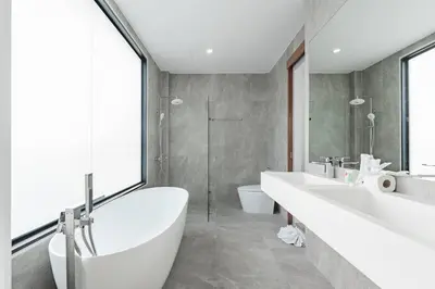 a bathroom with two sinks and a tub and a toilet at Peaceful Paradise in Saiyuan Villa V147 in Rawai Beach