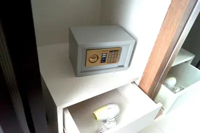 a small electrical box on top of a cabinet at Buasri By Ohm in Patong Beach