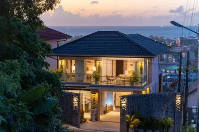 a house with a view of the ocean at \u542b\u65e9\u9910\u9001\u63a5\u673a Phuket patong 4Bedrooms seaview Pool villa in Patong Beach