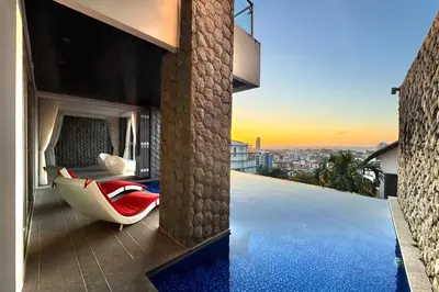 a bedroom on a house with a swimming pool at \u542b\u65e9\u9910\u9001\u63a5\u673a Phuket patong 4Bedrooms seaview Pool villa in Patong Beach