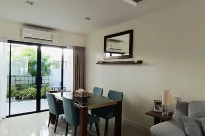 a dining room with a table and chairs and a mirror at Bangtao Beach 600m Laguna 3BDR 3,5bath with Jacuzzi and BBQ up to 8 guests 5 nights Free taxi in Phuket