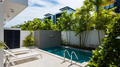 a swimming pool in the backyard of a house at Laguna Park 2 Family Pool Villa near Bang Tao Beach in Bang Tao Beach