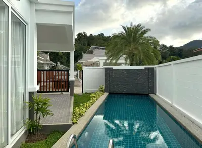 a swimming pool in the backyard of a house at Luxury villa Kamala Garden View by Lofty in Kamala Beach
