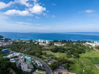 an aerial view of a city and the ocean at Coast Charm 6BR House Karon in Karon Beach
