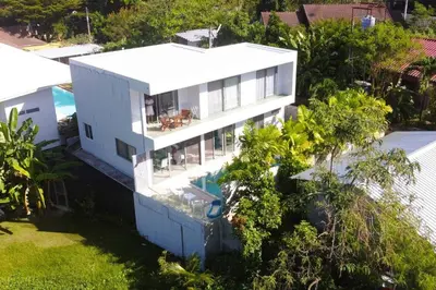 an aerial view of a house with a swimming pool at Modern pool villa 3 bedrooms in Rawai Beach