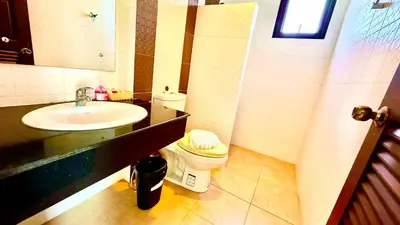 a bathroom with a sink and a toilet at KS Residence Patong in Patong Beach