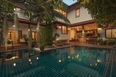 a swimming pool in the middle of a house at Villa on Panwa with 2 house keepers in Ban Bo Rae