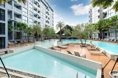 an image of a swimming pool in a building at Citygate Kamala Resort in Kamala Beach