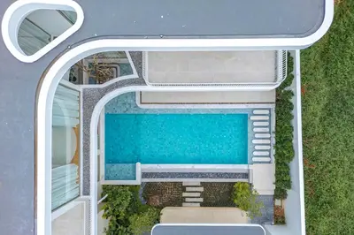 an overhead view of a swimming pool in a house at Nature's Rest Private Pool Villa Rawai in Phuket Town