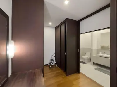 a room with a bathroom with a toilet and a mirror at Charming 3-bdr apartment with pool in Bang Tao Beach