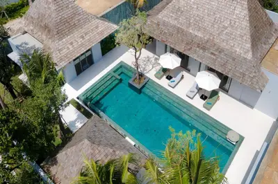 an aerial view of a villa with a swimming pool at Spacious 4BR Private 15m Pool Villa Anchan V10 in Gated Residence in Bang Tao Beach