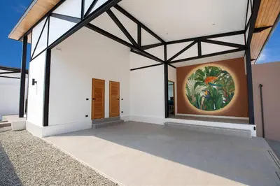 an empty room with a painting on the wall at New, Modern & Stylish 17m Eco Pool Villa Sunset Garden 11 in Rawai in Rawai Beach