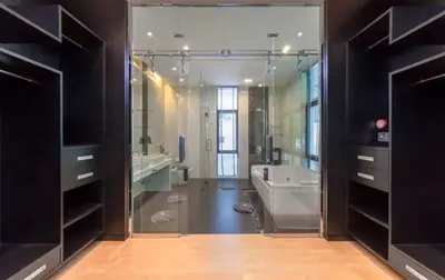a bathroom with a tub and a sink and a mirror at 15 - Ocean View Oasis in Kalim Beach in Patong Beach