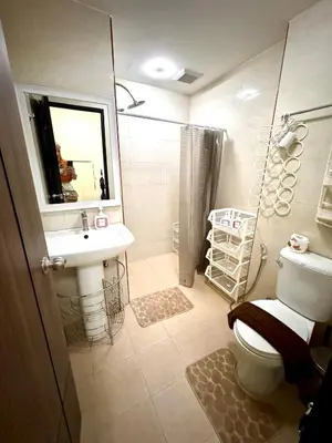 a bathroom with a toilet and a sink and a shower at NBC апартаменты у пляжа in Rawai Beach