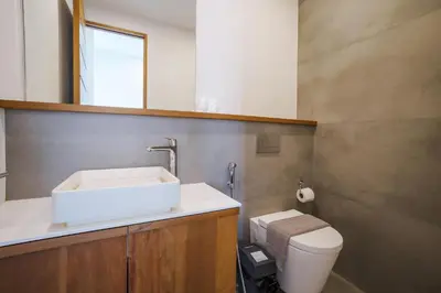 a bathroom with a sink and a toilet at Lapista 6 Bedroom Luxury Vila in Phuket Town