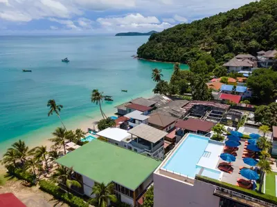 an aerial view of a resort and the ocean at Bandara Beach Resort, Phuket in Panwa Beach