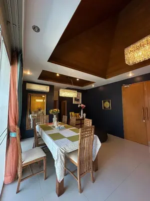 a dining room with a table and chairs at 4Bedroom Villa with Private Pool in Ban Klang