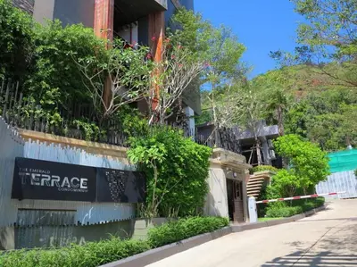 a sign on the side of a building at Emerald Terrace Condo 10-Family One Bed & Sofa Bed Garden View in Patong Beach