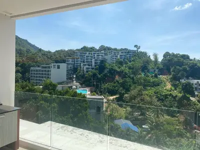 a view from the balcony of a building at Ark Studio only 10 Minutes from kataKaron Beach in Karon Beach